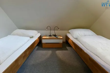 Schlafzimmer Kleine Pinkenburg Ferienwohnung Nord und Süd