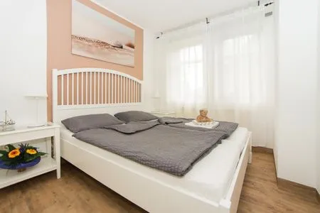 Schlafzimmer Landhaus Heine Auszeit Whg. 02