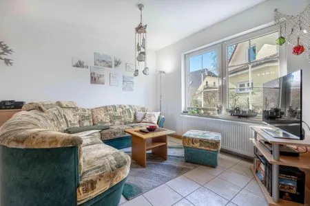 Wohnbereich mit TV  Am Deich Haus 8