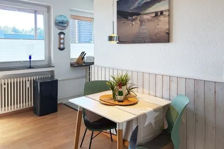 Wohnzimmer Haus Diana Ferienwohnung „Kniepsand"