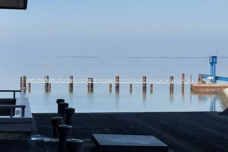 Blick vom Balkon auf das Wattenmeer Haus Nordenlicht Ferienwohnung "Lütj Seeröver"