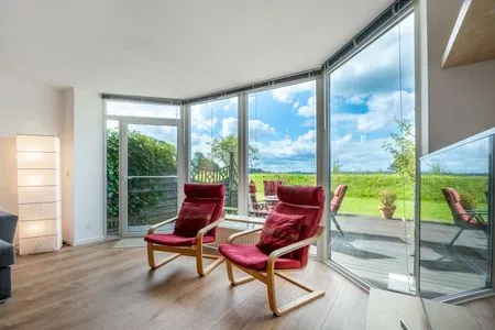 Wohnzimmer Ferienwohnung Schleiwiese mit Meerblick in Stexwig