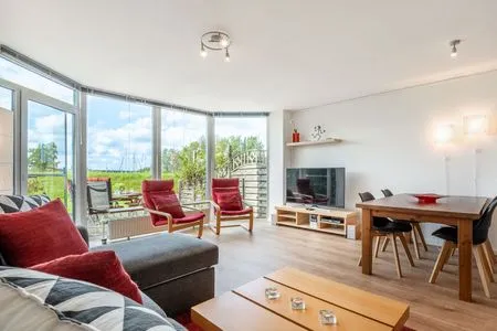 Wohnzimmer Ferienwohnung Schleiwiese mit Meerblick in Stexwig