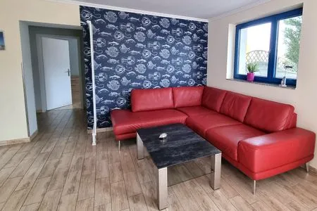 Wohnzimmer Ferienwohnung Ostrea Breege - mit Garten und Grill