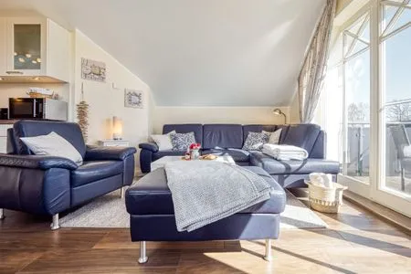 Wohnbereich mit Sofa und Sessel Neue Reihe Neue Reihe 28 - Wohnung Vogelnest