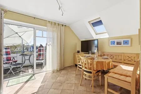 Essbereich mit Blick auf den Balkon  Glebbe 17 - Wohnung Südblick