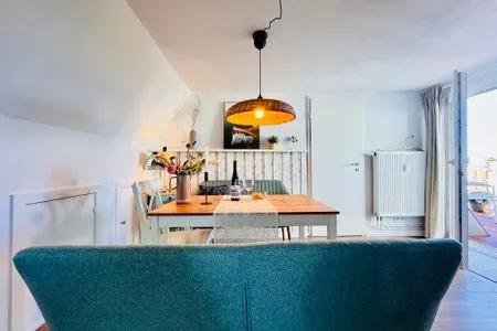 Wohnzimmer mit Essplatz und Meerblick Nordkiek No. 8