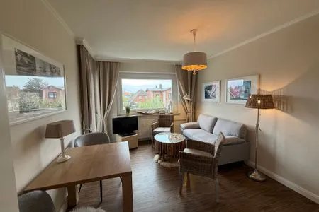 Wohnzimmer Ferienwohnung im Haus Nordland App 34