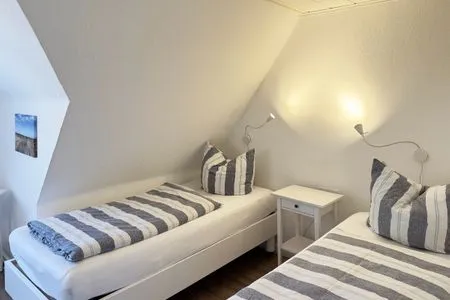 Schlafzimmer Haus Frisia Ferienwohnung Frisia 5