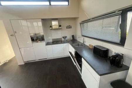  EuroParcs Bad Meersee Chalet Küstenzeit mit Zaun Haus Nr. 97