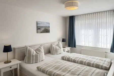 Schlafzimmer Haus Frisia Ferienwohnung Frisia 3