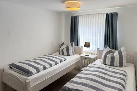 Schlafzimmer Haus Frisia Ferienwohnung Frisia 3