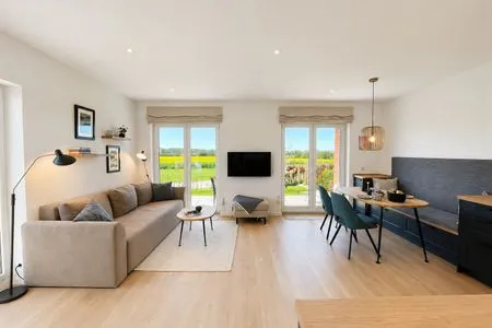 Großer und heller Wohn-/Essbereich mit Terrassenzugang Ferienhaus Landliv Stuuv
