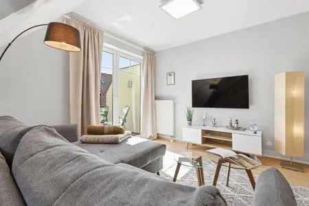 Wohnbereich mit Blick auf den Balkon Hoppenberg 9 OG links - Zur Kogge