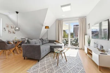 Wohnbereich mit Blick auf den Balkon Hoppenberg 9 OG links - Zur Kogge