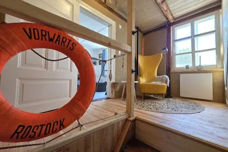 Wohnzimmer Kleine Fischerhütte - uriges Ferienhaus am Meer