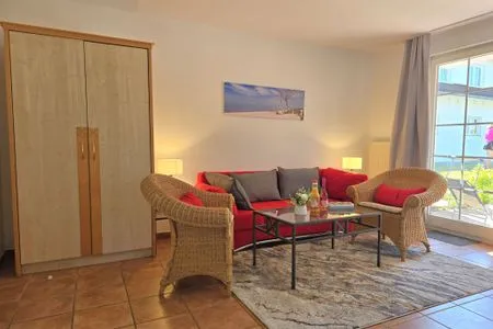 Wohnzimmer Ferienwohnung Seehund für Ostsee-Urlaub mit Hund in ländlicher Lage auf Rügen