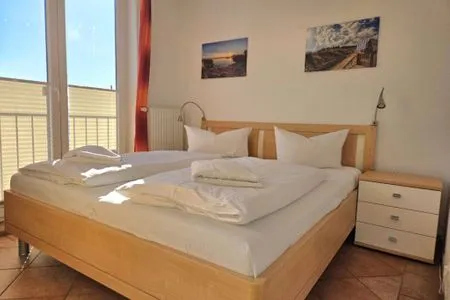 Schlafzimmer Ferienwohnung Kutterfisch - direkt im Stadthafen