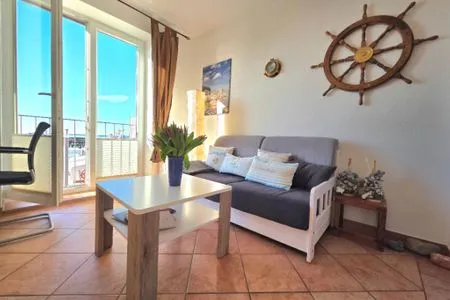 Wohnzimmer Ferienwohnung Kutterfisch - direkt im Stadthafen