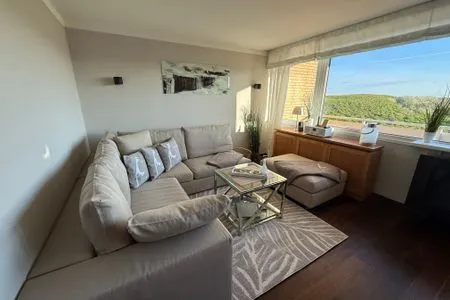 offener Wohnbereich Ferienwohnung Brandenburgerstr. 11 - Dühne16 mit kleinem Meerblick /  PKW-Stellplatz außen ist mit einem Außweis zu versehen als Berechtigung.