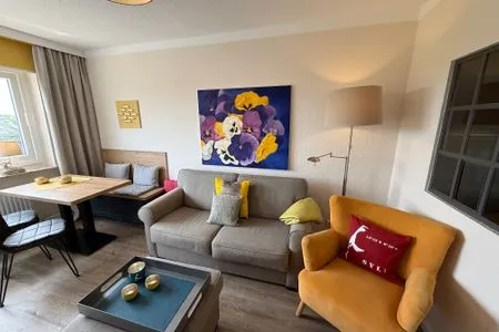 Wohnzimmer Ferienwohnung im Haus Nordland App 88
