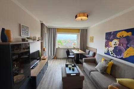 Wohnzimmer Ferienwohnung im Haus Nordland App 88