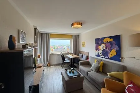 Wohnzimmer Ferienwohnung im Haus Nordland App 88