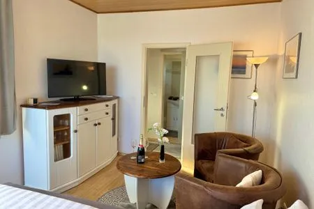 Wohnzimmer Ferienhaus Seeblick in Sassnitz auf Rügen mit Terrasse