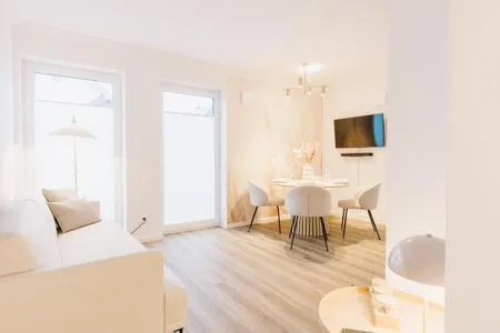 Wohnzimmer de Diek - Suite 3 | Seitliche Deichlage