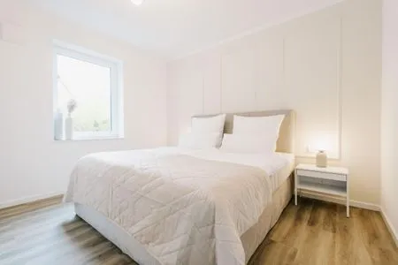 Schlafzimmer de See - Suite 3 | Seitliche Deichlage