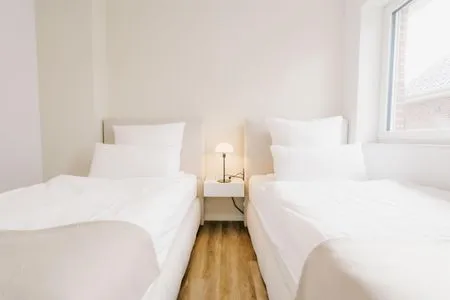 Schlafzimmer de See - Suite 4 | Seitliche Deichlage