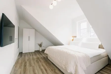 Schlafzimmer de See - Suite 4 | Seitliche Deichlage