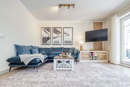Wohnbereich mit Sofa Parkresidenz am Hafen Wohnung HF 14 - "Sandburg Zingst"