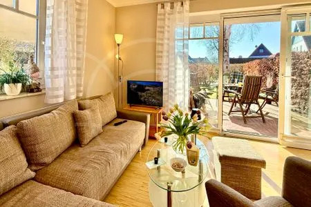 Wohnbereich mit Blick zur Terrasse  Glebbe 17 - Wohnung 3