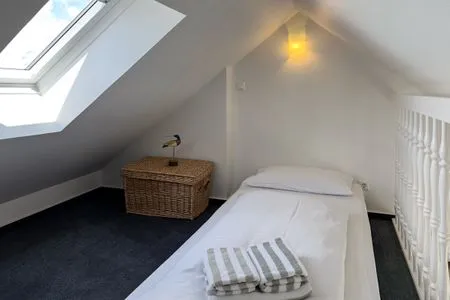Empore Ferienwohnung „Südspitze 10 mit Meerblick"