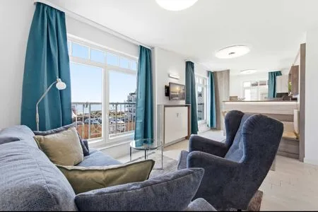 Hauptansicht Ferienwohnung Küstenkind direkt am Strand, modern eingerichtet mit Meerblick