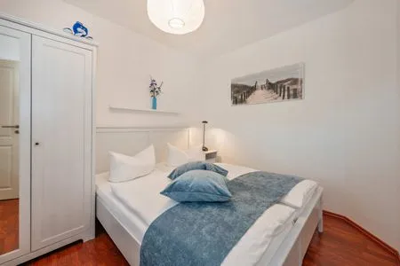 Schlafzimmer Ferienwohnung Tintenfisch