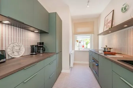 Küche / Küchenzeile Ferienwohnung Sonnenland mit 2 Bädern, modern eingerichtet & nur 300 Meter zum Strand