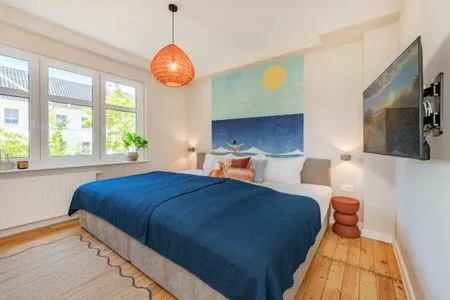 Schlafzimmer Ferienwohnung Sonnenland mit 2 Bädern, modern eingerichtet & nur 300 Meter zum Strand