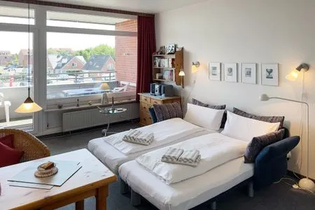 Wohnzimmer Haus Nordenlicht Ferienwohnung „Holm"