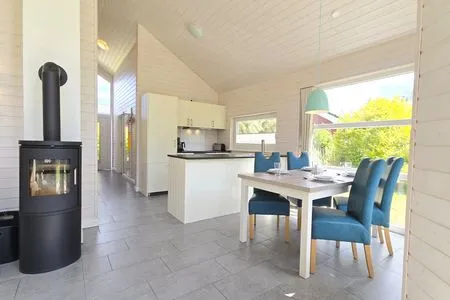 Wohnzimmer Ferienhaus "Kiek Ut" im Ferienpark Holm an der Ostsee