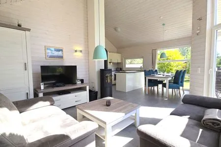 Wohnzimmer Ferienhaus "Kiek Ut" im Ferienpark Holm an der Ostsee