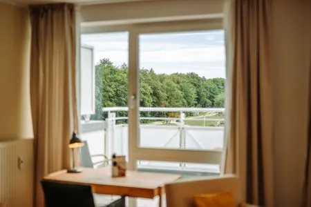 Ferienwohnung Deichkieker Aparthotel Zingst - Wohnzimmermer  Deichkieker