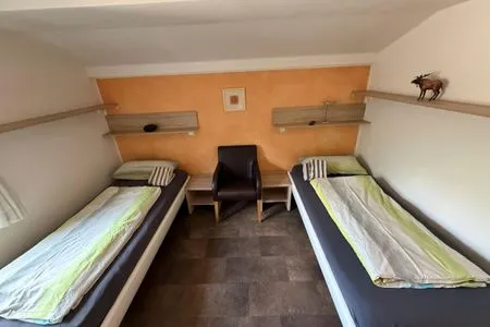 Schlafzimmer Elsbach 4a - Lastering Ferienhäuser & Apartments