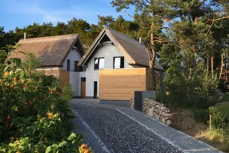 Fassade / Eingang Ferienhaus Reethäus'l mit Whirlpool, Sauna, Kamin und Terrasse