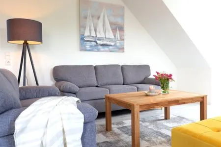 Wohnzimmer mit Sofas und Smart TV Landloft Nedderby