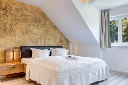 Schlafzimmer Ferienwohnung Ostseenest Bernstein mit Terrasse & nur 800 m zum Strand