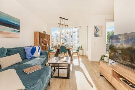 Hauptansicht Ferienwohnung Haff & Herz mit Balkon, Freizeit- und Kinderspielbereich