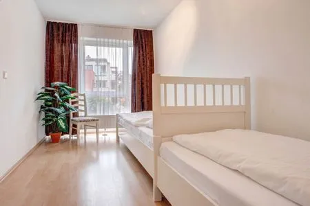 Schlafzimmer Ferienwohnung Meereswoge mit Balkon und nur 100 m bis zum Strand
