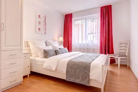 Schlafzimmer Ferienwohnung Meereswoge mit Balkon und nur 100 m bis zum Strand